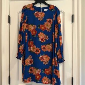 Dress with smocked sleeves